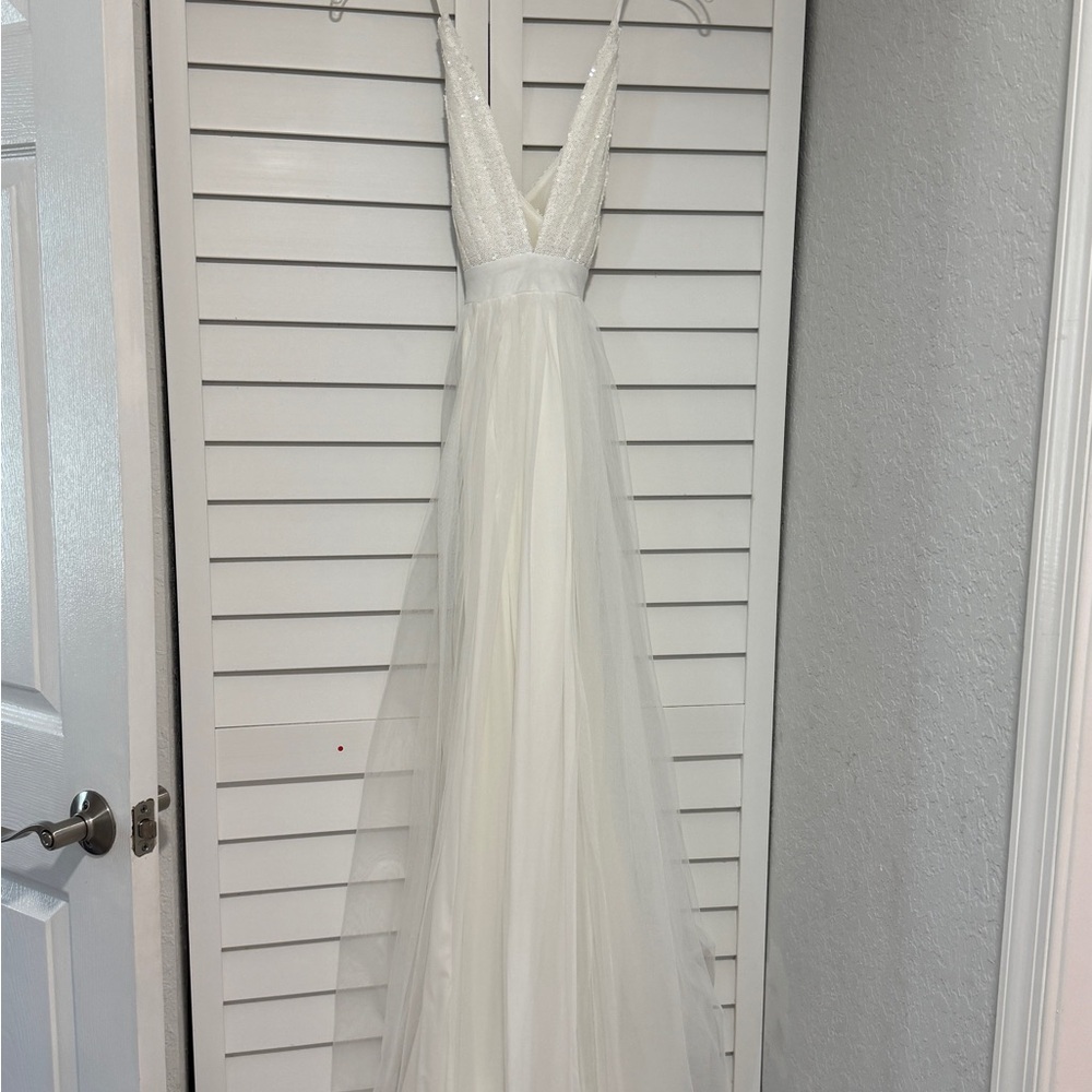 Elegant White Gown with Sequin Bodice